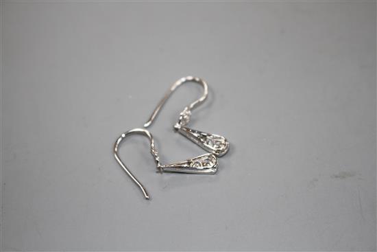A pair of white metal and graduated diamond set fan-saped drop earrings, overall including ear wire 23mm, gross 1.1 grams.